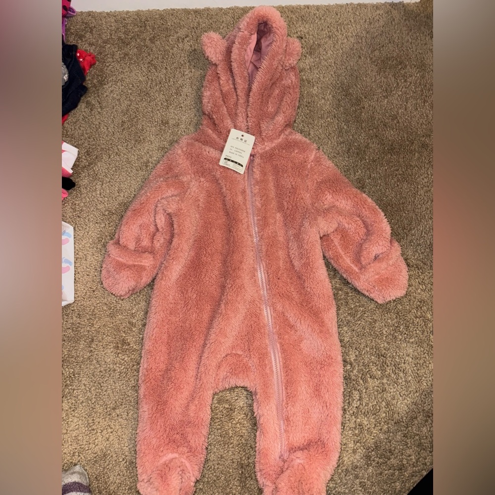 Brand new hooded fuzzy coverall